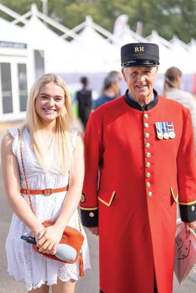 This Esme with a man dressed as British royal guard.