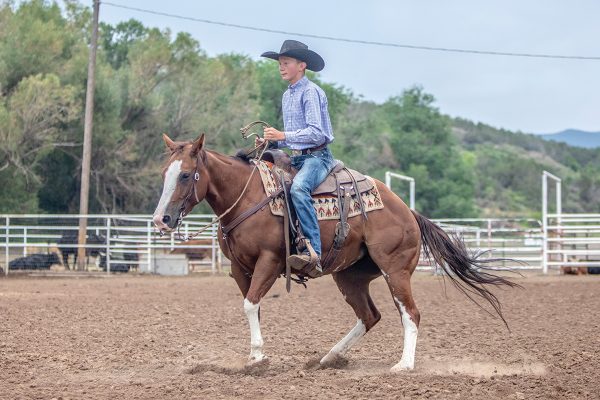 Parker Ralston turning his horse