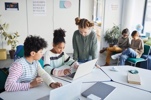 Students working together in a classroom.